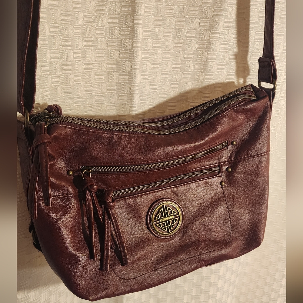 Burgundy Crossbody Bag Gold Logo Adjustable Strap Great For Travel Many Pockets